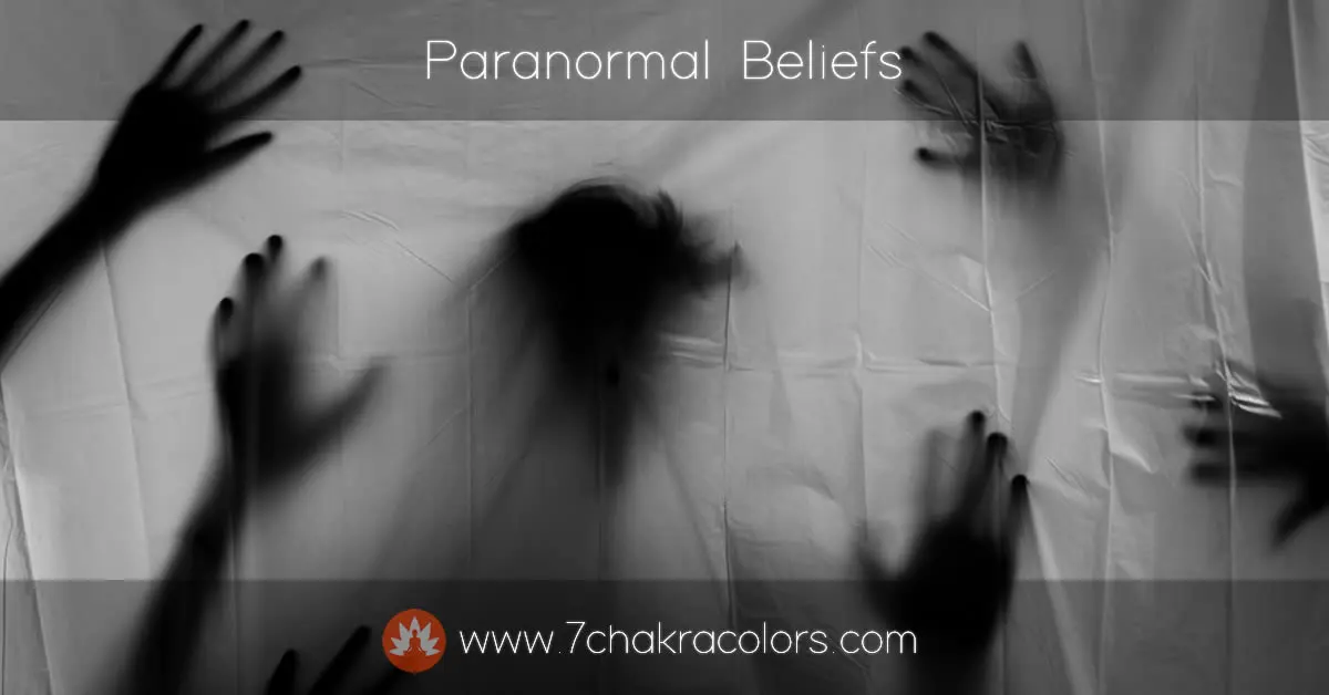 shadows of hands and head behind a background lit sheet
