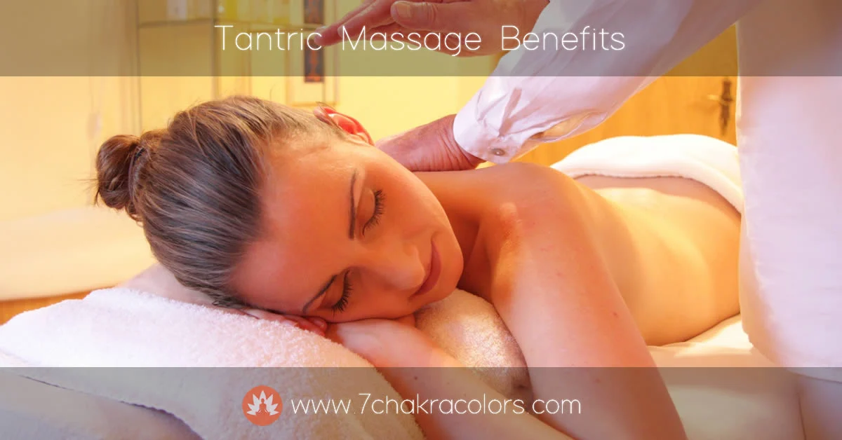 woman lying on a massage table being massaged by placing hands