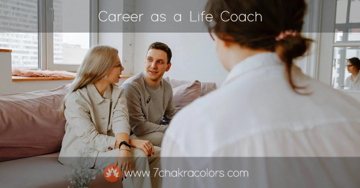 a couple sitting on a couch being coached by a woman
