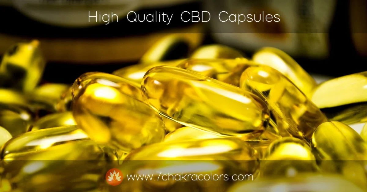 a pile of transparent yellow capsules