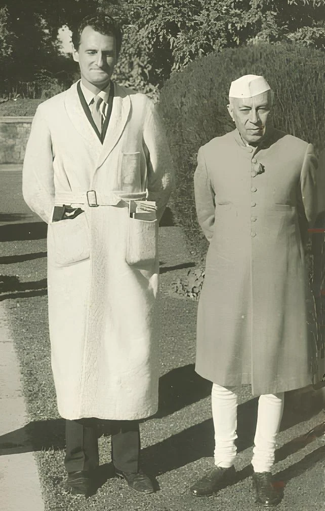 a man in a long robe and a man in a white hat