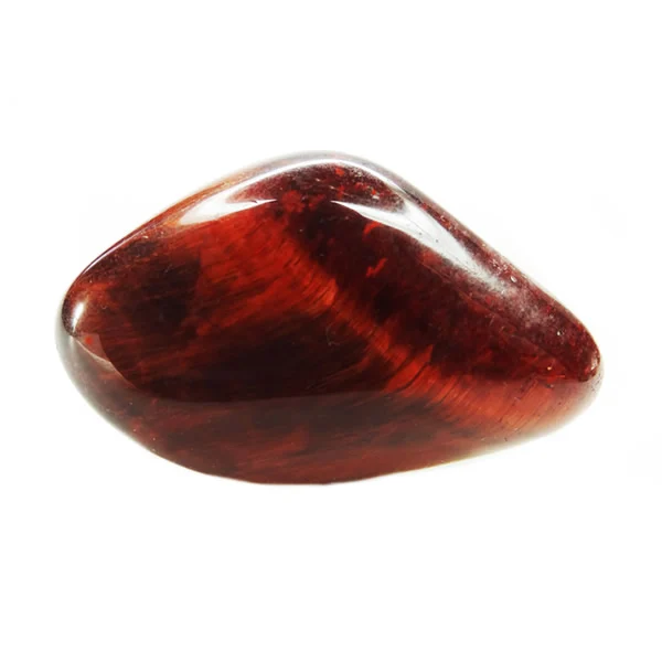a red tigers eye crystal on a white background