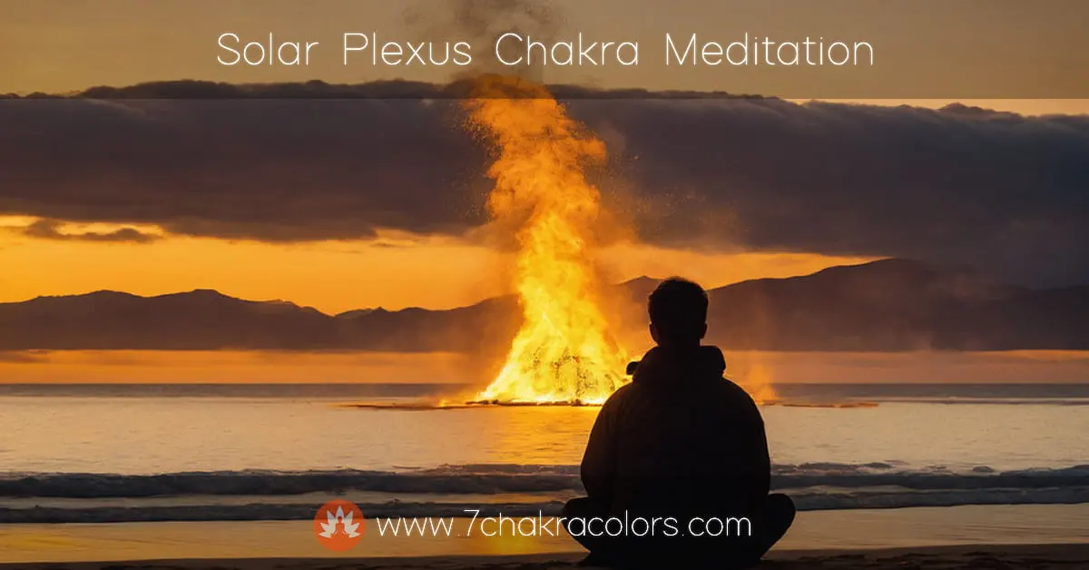 solar plexus chakra energy symbolized by a man sitting on a sandy beach looking at the big yellow fire burning in front of him