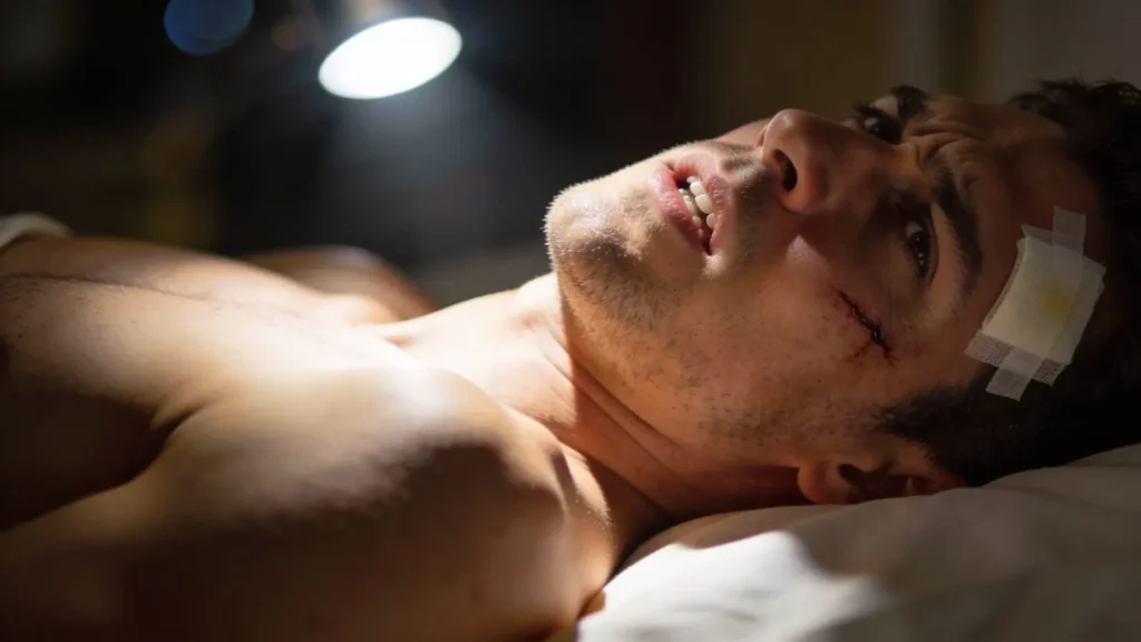 man lying down healing from physical trauma